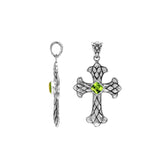 Peridot gemstone cross pendant in sterling silver with handcrafted Balinese silverwork, spiritual artisan jewelry.